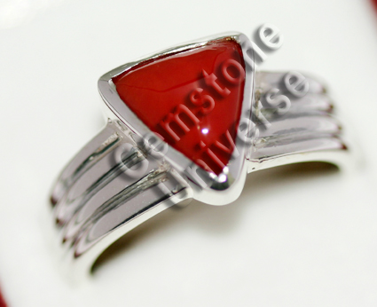 Natural triangular Italian Red Coral of 3.38 carats set in Sterling Silver 925 Gents ring.gemstoneuniverse.com Natural triangular Italian Red Coral of 3.38 carats set in Sterling Silver 925 Gents ring.gemstoneuniverse.com