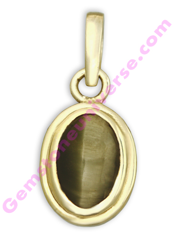 Magnificent Quartz Cat’s Eye with a sharp Chatoyant band! Cat’s Eye the powerful gemstone for Ketu / South node, set in a sterling silver pendant! Gemstoneuniverse.com