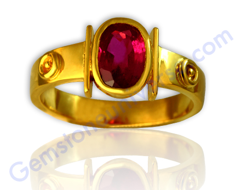 Sparkling Vivid Pinkish Red Tajikistan Ruby set in a talismanic Gold ring with the sacred symbols of Sun! Ruby the gem of Sun-King of all planets! Gemstoneuniverse.com