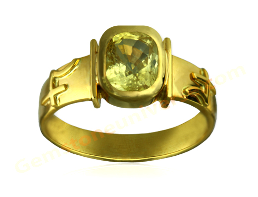 Yellow Sapphire Talismanic ring with inscribed Jupiter symbols for an enchanting Guru Talisman. Pukhraj the Gem of Guru-The Planet of Good luck, knowledge and prosperity. Gemstoneuniverse.com