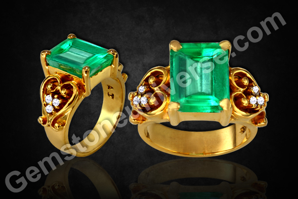The exceptionally rare 4.96 carats Emerald Cut Colombian Emerald with 5 pointers Round Brilliant Diamonds that compose the Royal Ring.