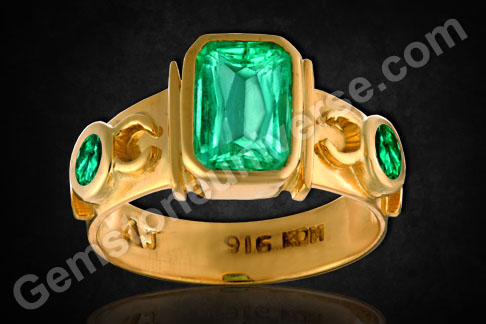 Early summer grass green colored Natural Emerald flanked by royal deep green Colombian Emerald accents set in mystical Mercury symbols!