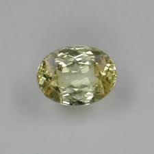A finished, faceted and polished yellow sapphire