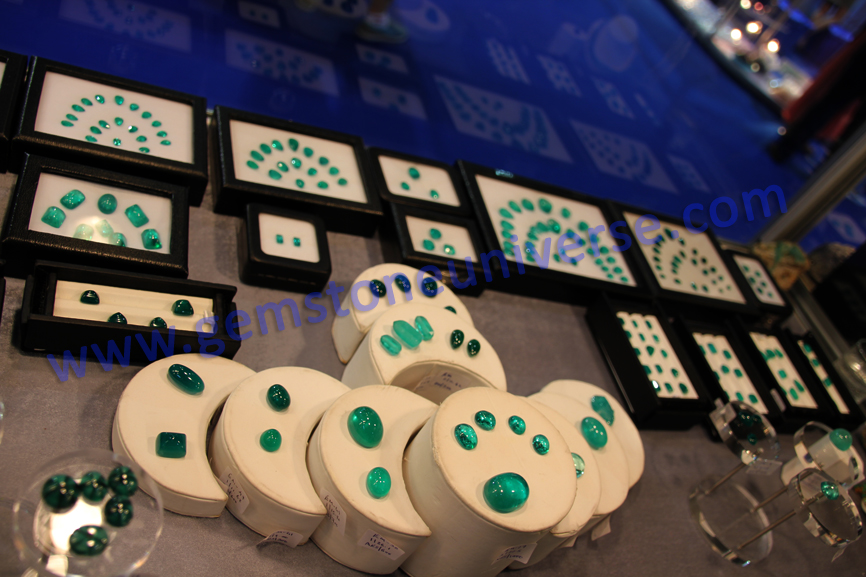 Colombian Emerald Tower 1 at Gemstoneuniverse exhibit with valuable Cabochons and Trapiche Emeralds