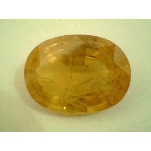 Poor Quality Mineral Sold as Yellow Sapphire in the market for Astrological Purpose. It Fails all Parameters of being a Gemstone let alone being a Jyotish Gemstone Poor Quality Mineral Sold as Yellow Sapphire in the market for Astrological Purpose. It Fails all Parameters of being a Gemstone let alone being a Jyotish Gemstone